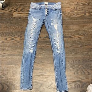 Ciara skinny exposed button